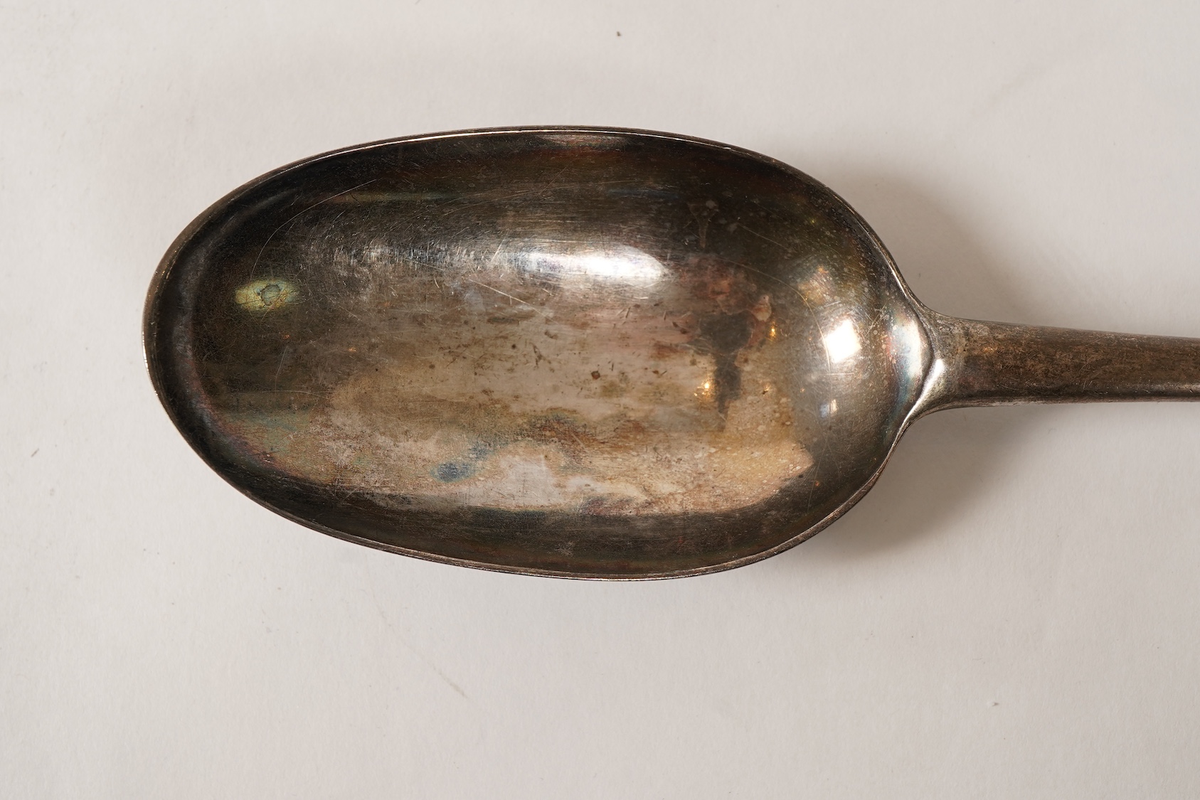 A George II silver Hanoverian pattern large basting or hash spoon